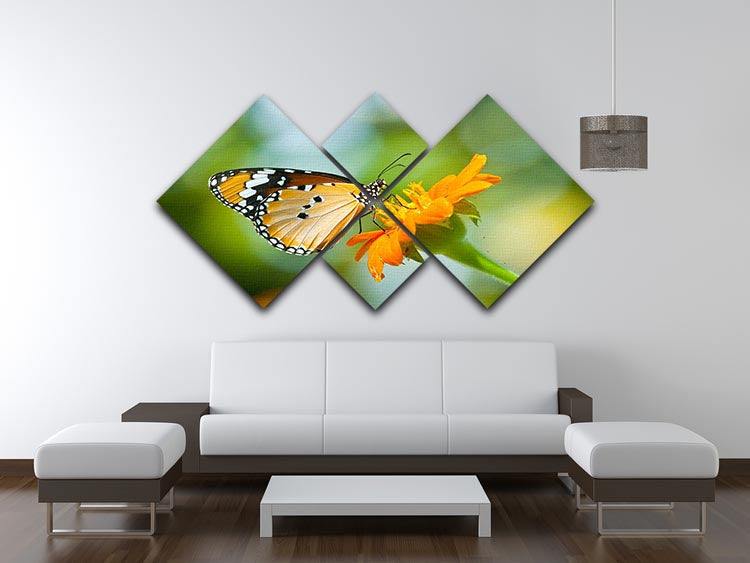 A vibrant orange butterfly resting on a flower, displayed in a 4-square multi-panel canvas artwork, perfect for home decor.