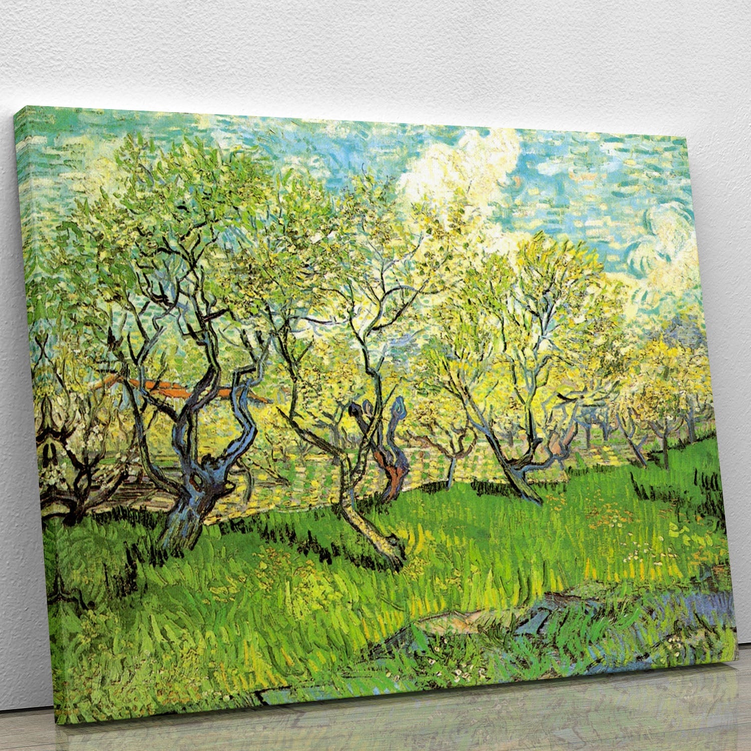 Canvas print of Van Gogh's Orchard in Blossom 2, showcasing vibrant blossoms and a serene landscape.