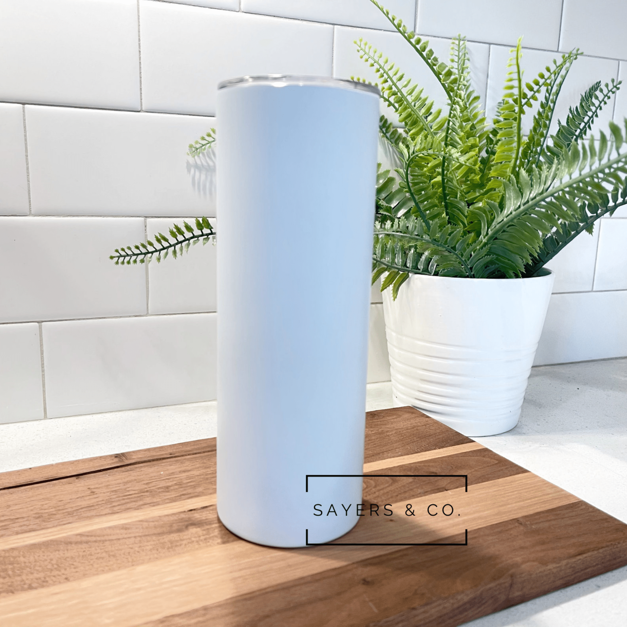 Pack of 20 matte white straight sublimation tumblers with straws and non-slip bottoms, elegantly packaged in white boxes.