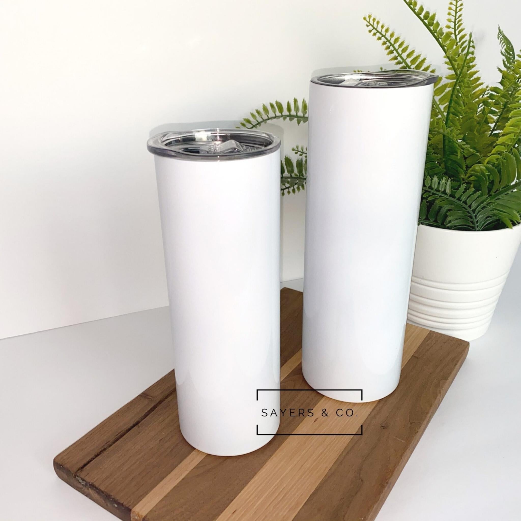Pack of 20 white skinny straight sublimation tumblers, 20oz and 30oz sizes, with straws and individual white boxes.