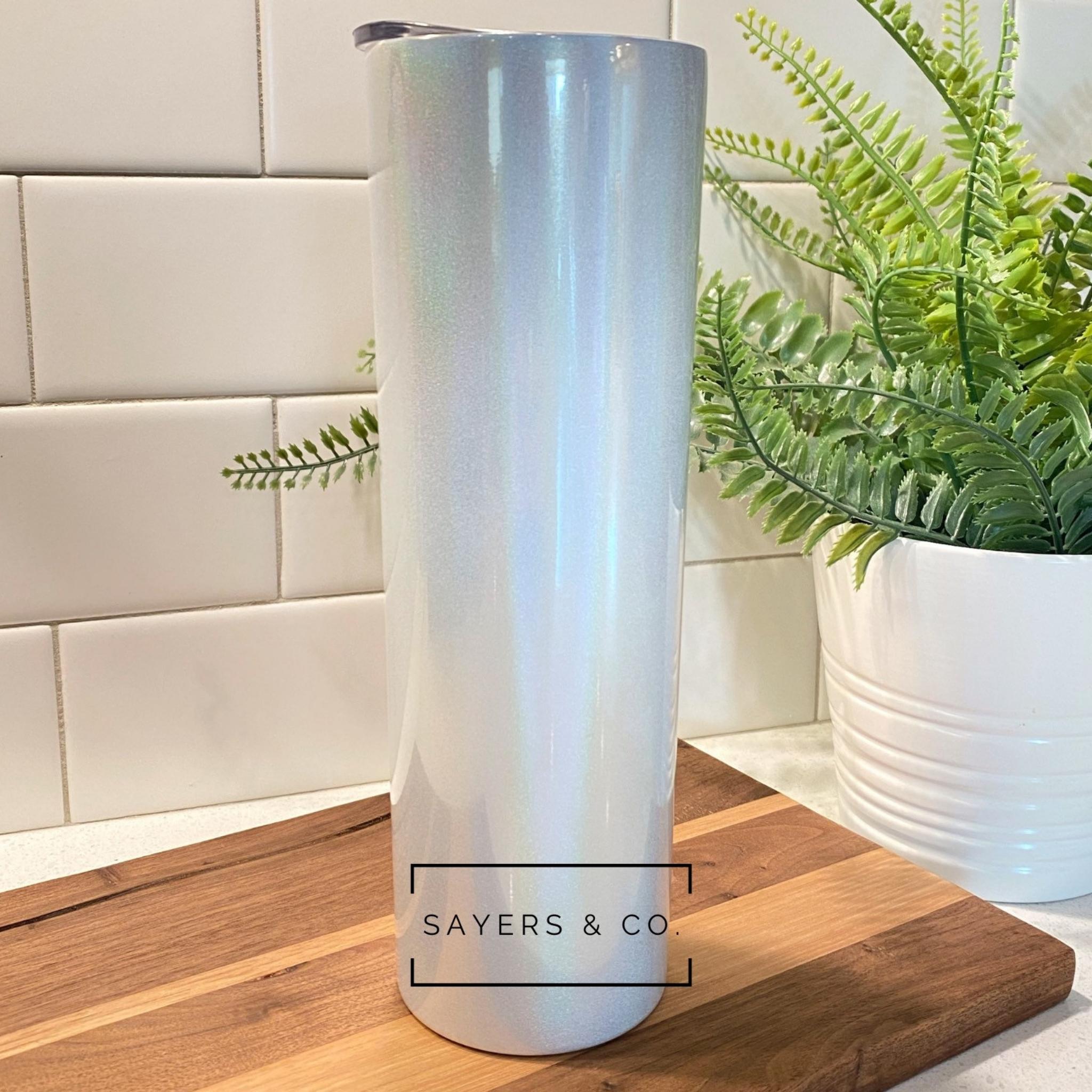 Pack of 20, 30oz white glitter skinny straight sublimation blank stainless steel tumblers with straws in individual boxes.