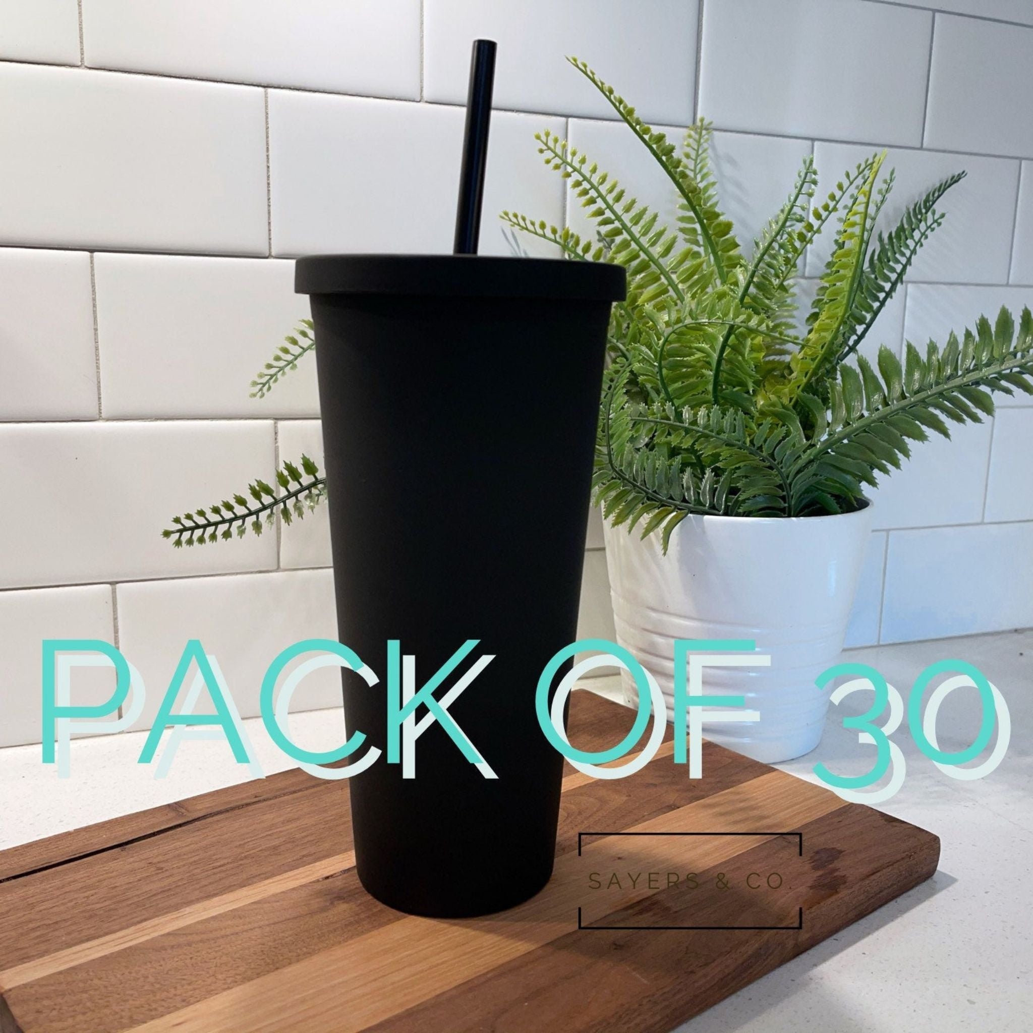 Pack of 30 stylish 22oz acrylic skinny matte black tumblers with screw top lids and matching straws, individually boxed.