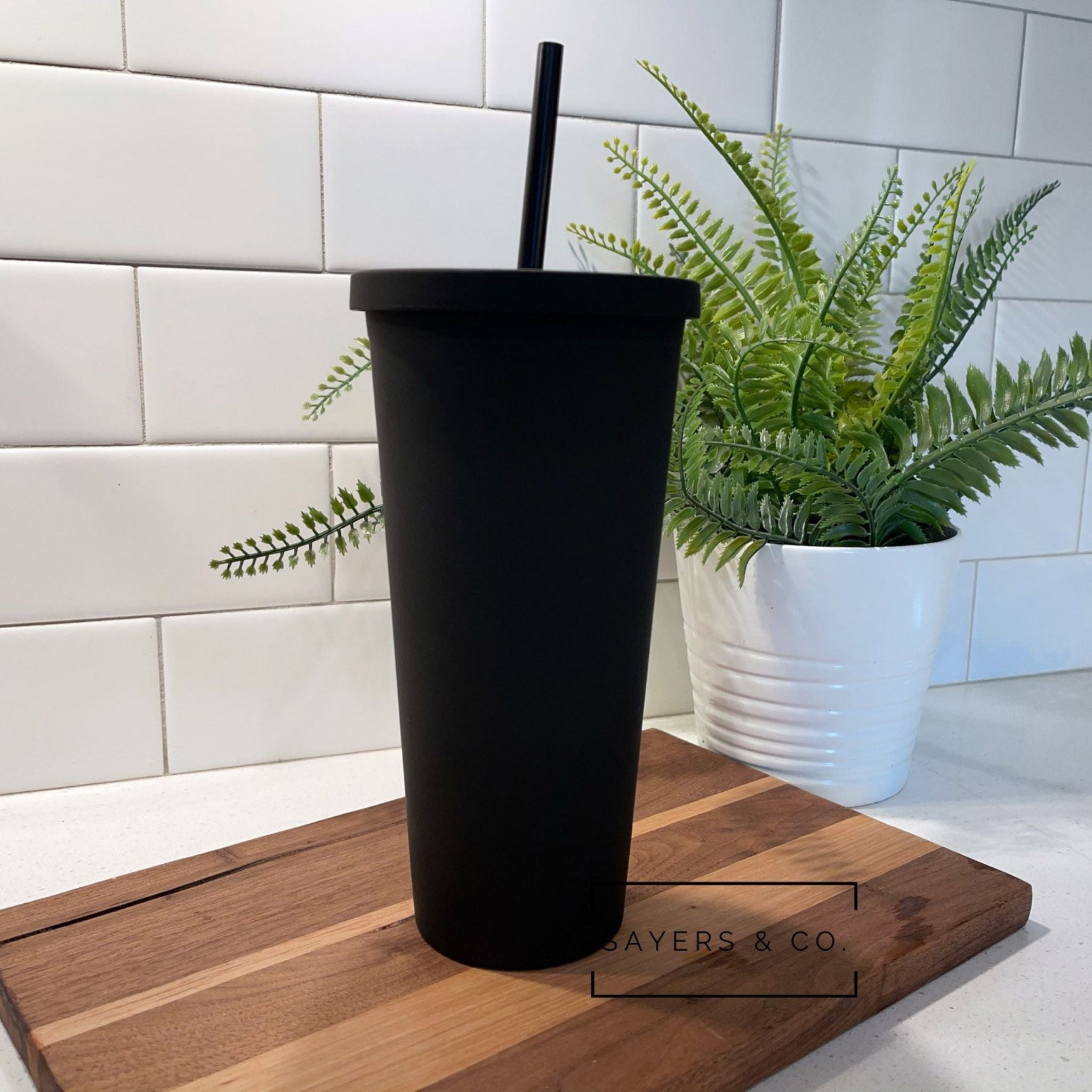 Pack of 30 stylish 22oz acrylic skinny matte black tumblers with screw top lids and matching straws, individually boxed.