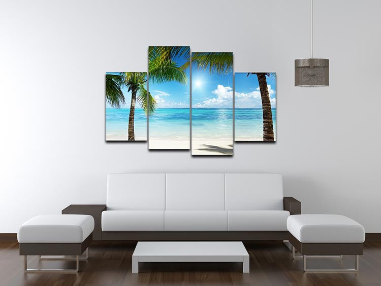 A beautiful 4-split canvas artwork featuring palm trees and a beach scene, creating a serene tropical atmosphere.