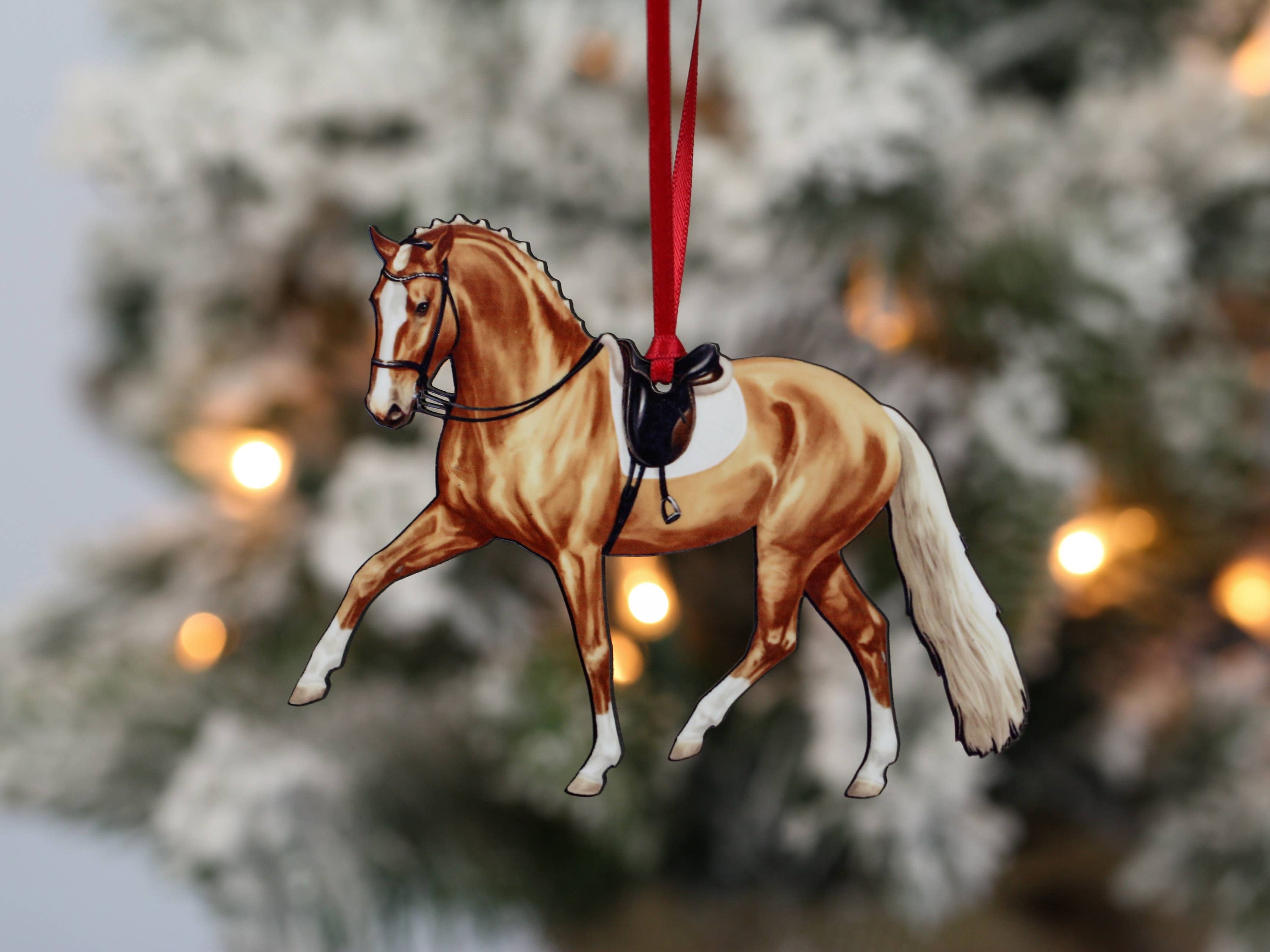 Palomino Dressage Horse Ornament showcasing half pass movement, handmade from composite wood with glossy finish.