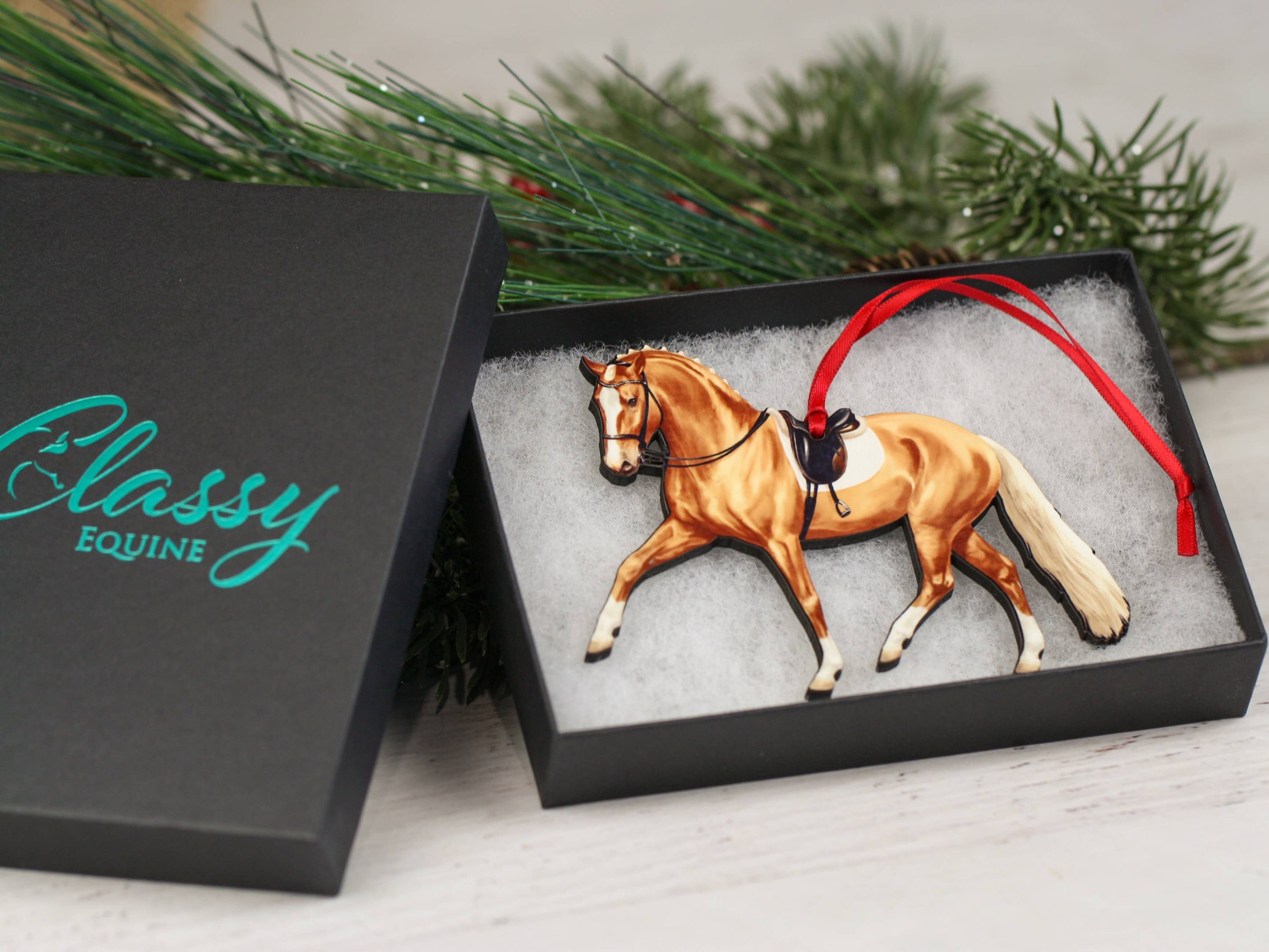 Palomino Dressage Horse Ornament showcasing half pass movement, handmade from composite wood with glossy finish.
