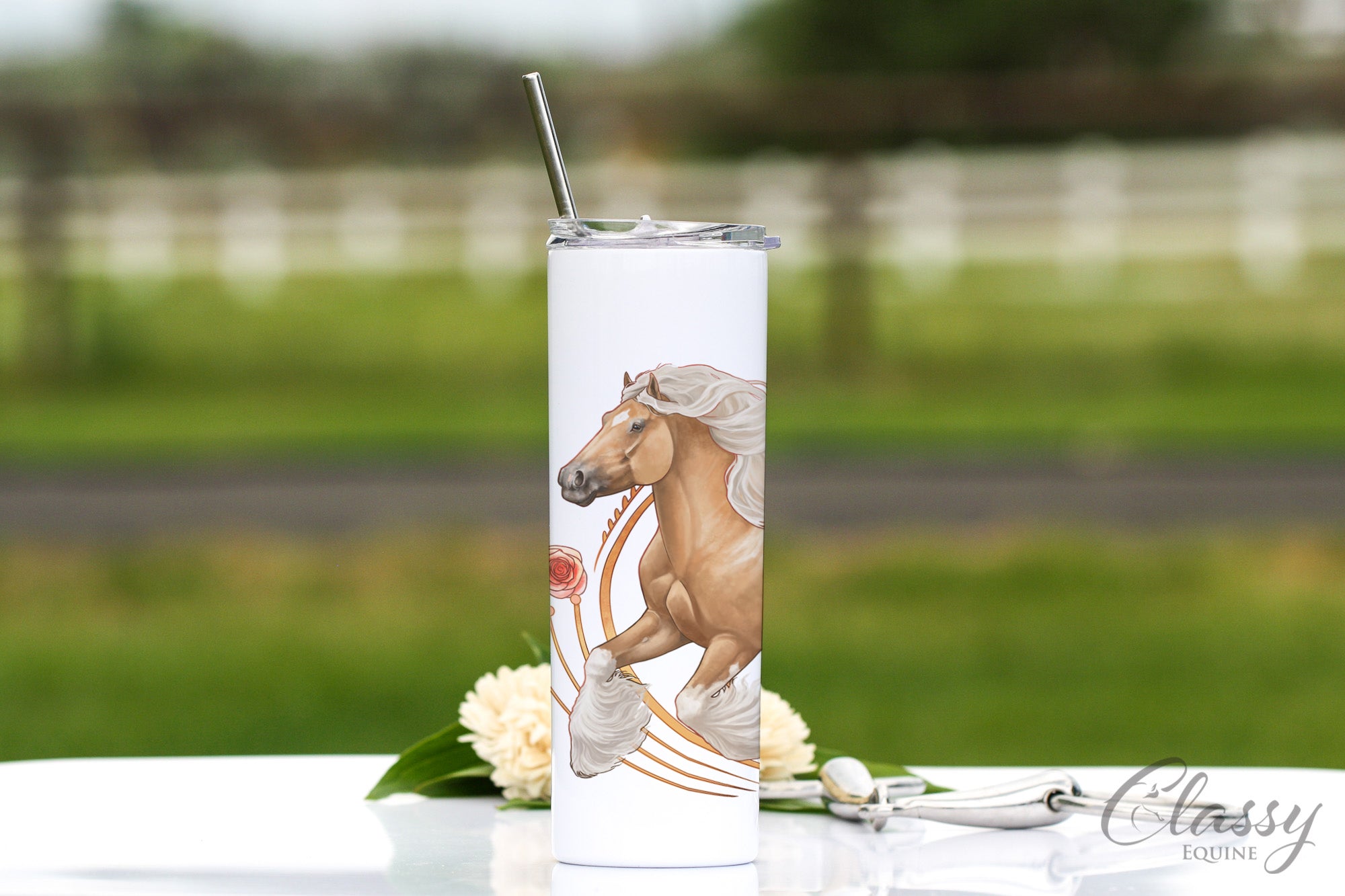 20 oz skinny tumbler featuring an elegant palomino Gypsy Horse design, made of insulated stainless steel with a straw and spill-proof lid.