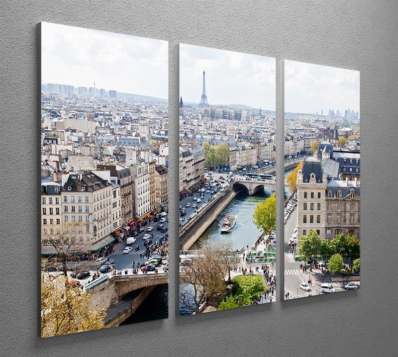 Three-panel canvas print showcasing the Paris skyline from Notre Dame, featuring vibrant colors and intricate details.