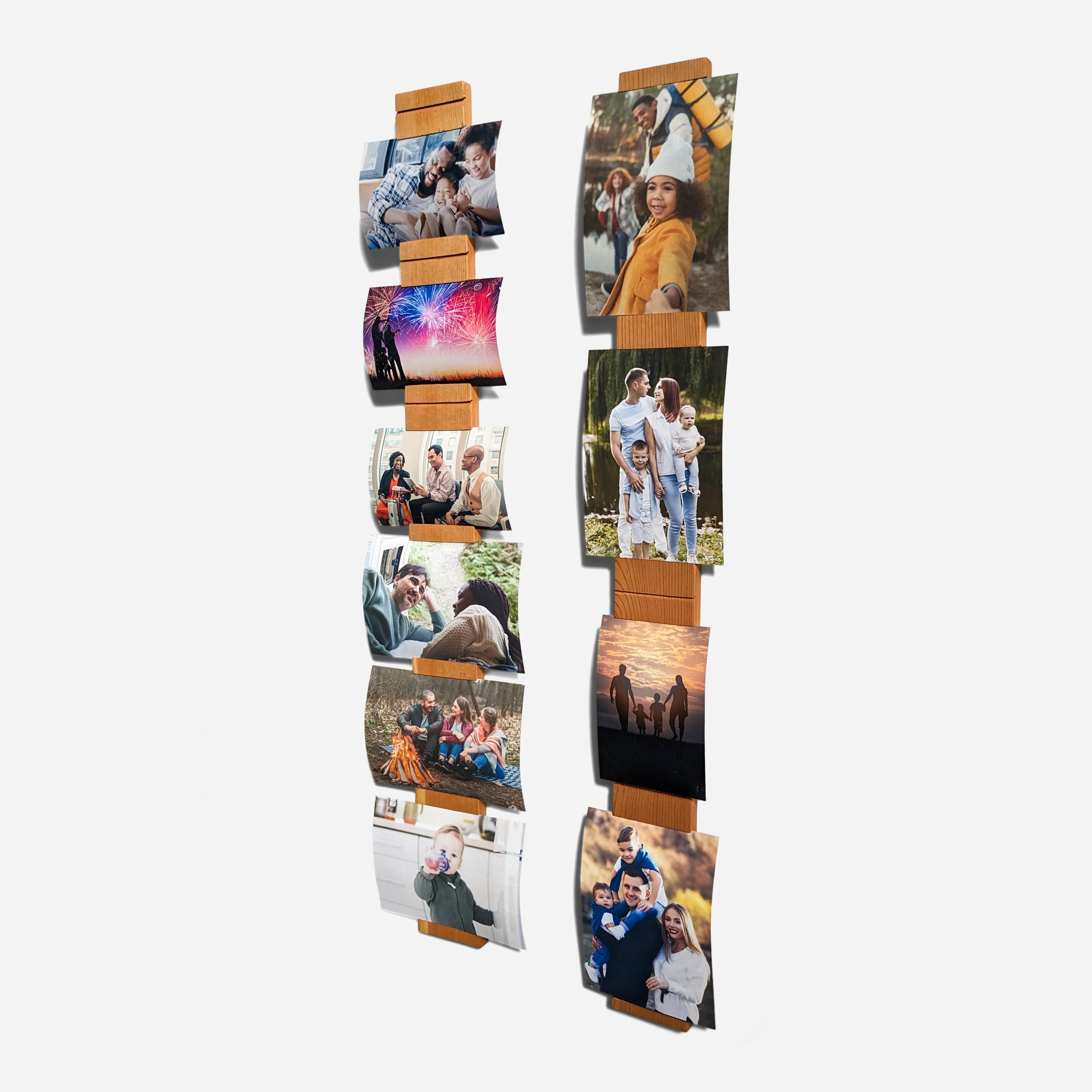 A contemporary wall-mounted photo holder made from sustainable wood, showcasing four photo slots for 3" x 5" or 4" x 6" pictures.