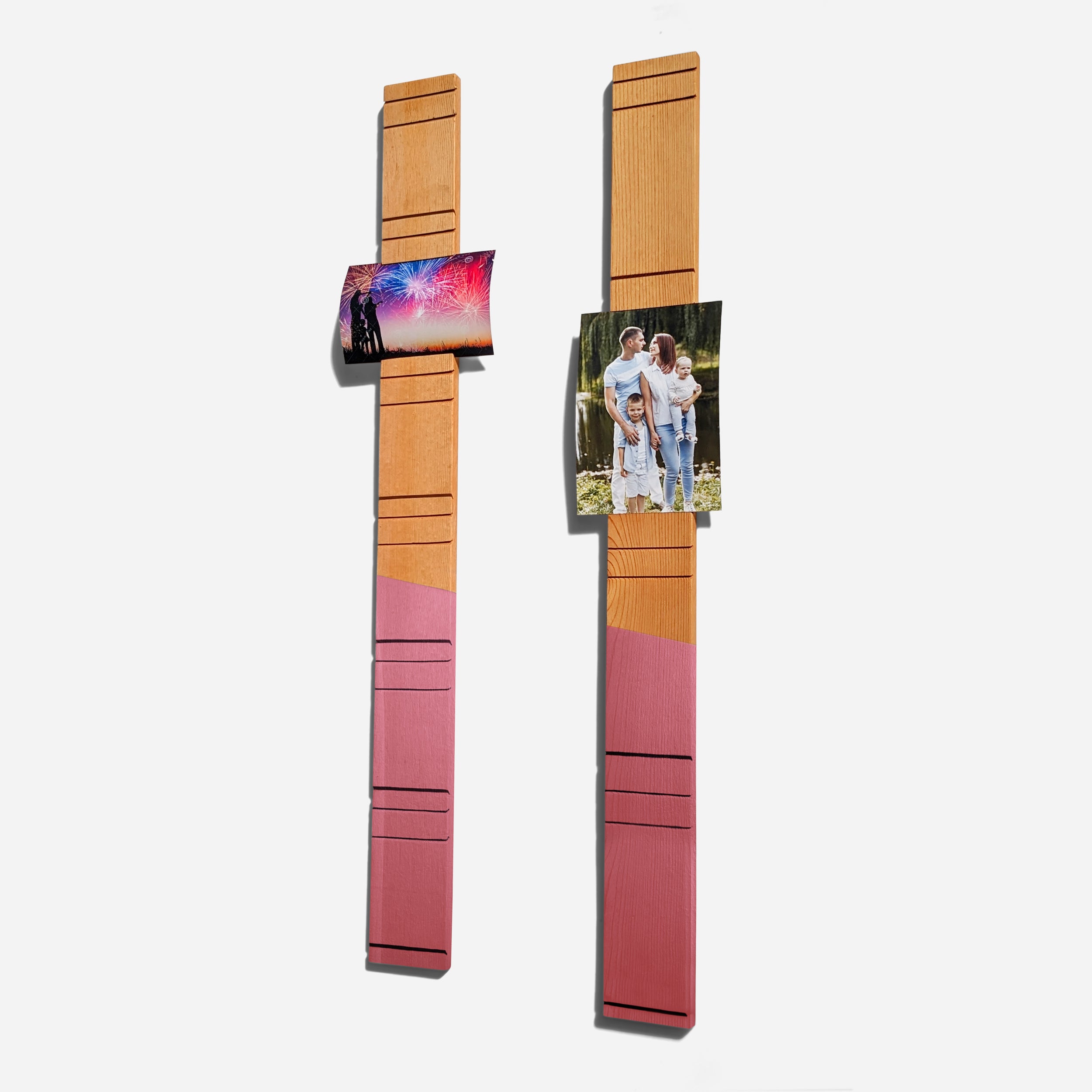 A contemporary wall-mounted photo holder made from sustainable wood, showcasing four photo slots for 3" x 5" or 4" x 6" pictures.