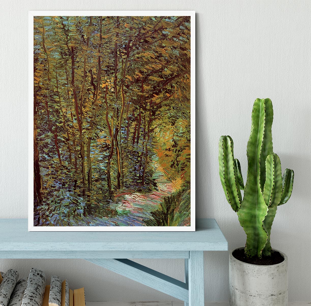 Framed print of Van Gogh's 'Path in the Woods', showcasing vibrant colors and intricate details in a stylish frame.