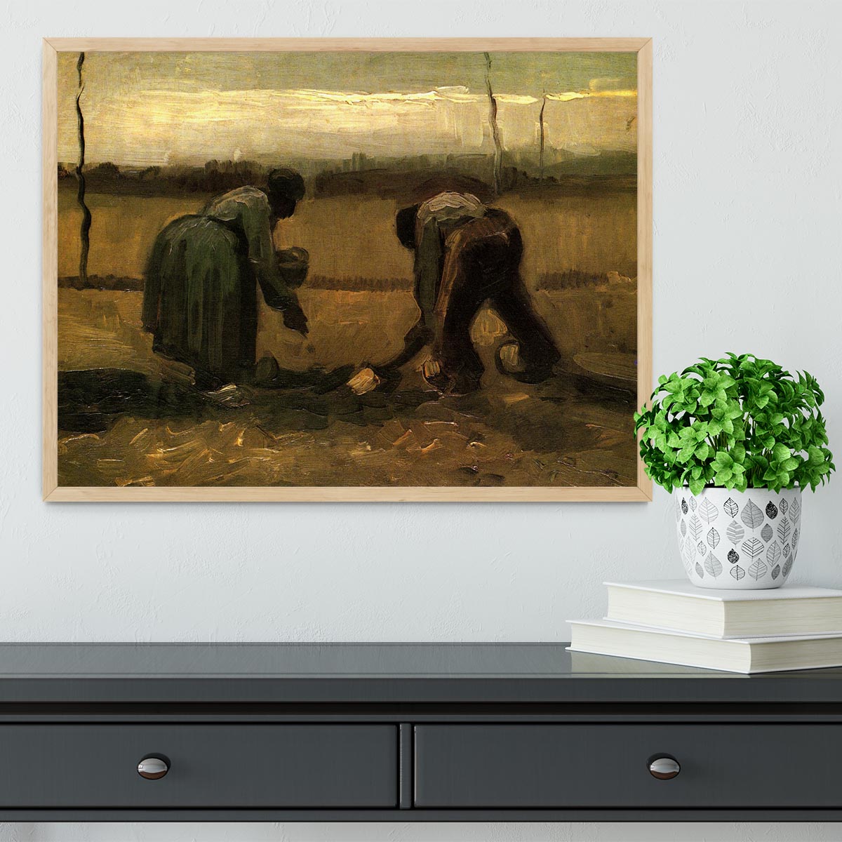 Framed print of Van Gogh's Peasant and Peasant Woman Planting Potatoes, showcasing vibrant colors and intricate details.