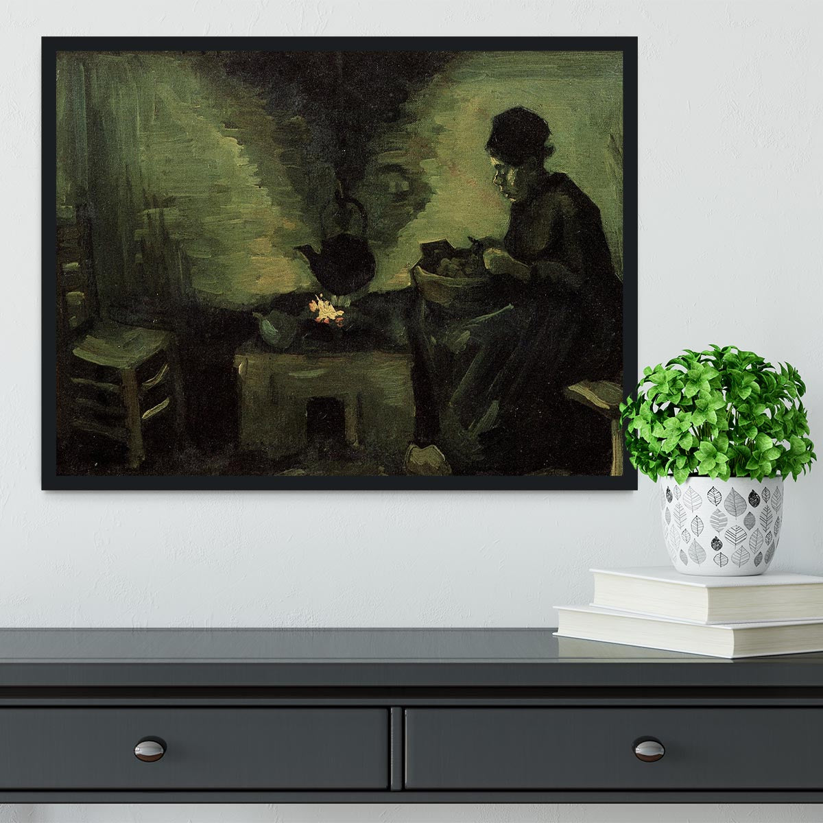 Framed print of Van Gogh's Peasant Woman by the Fireplace, showcasing vibrant colors and intricate details.