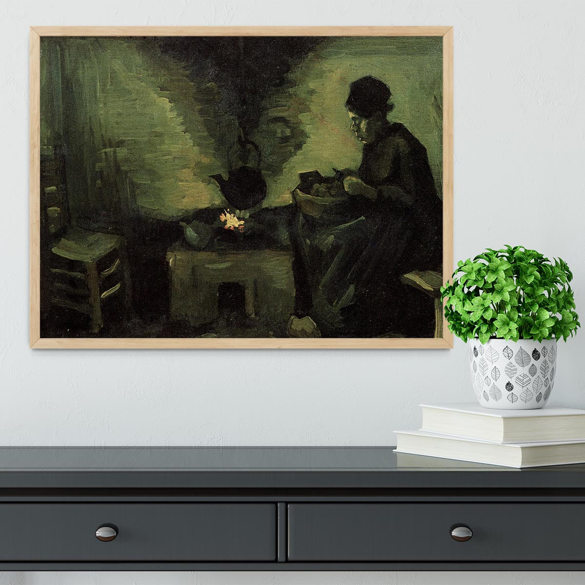 Framed print of Van Gogh's Peasant Woman by the Fireplace, showcasing vibrant colors and intricate details.