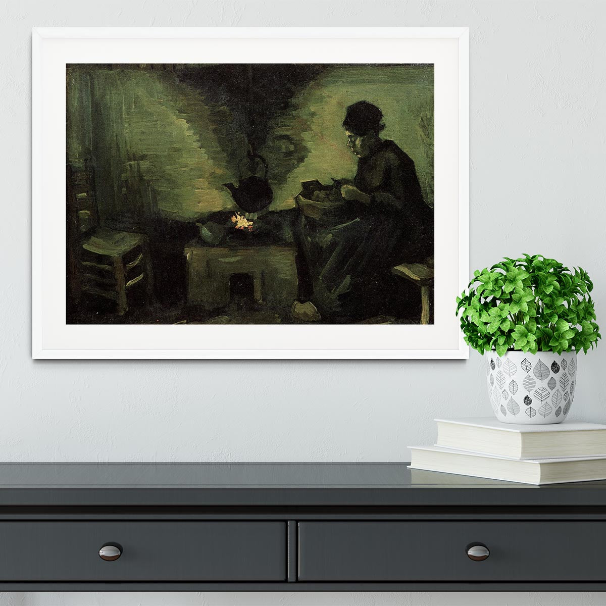 Framed print of Van Gogh's Peasant Woman by the Fireplace, showcasing vibrant colors and intricate details.
