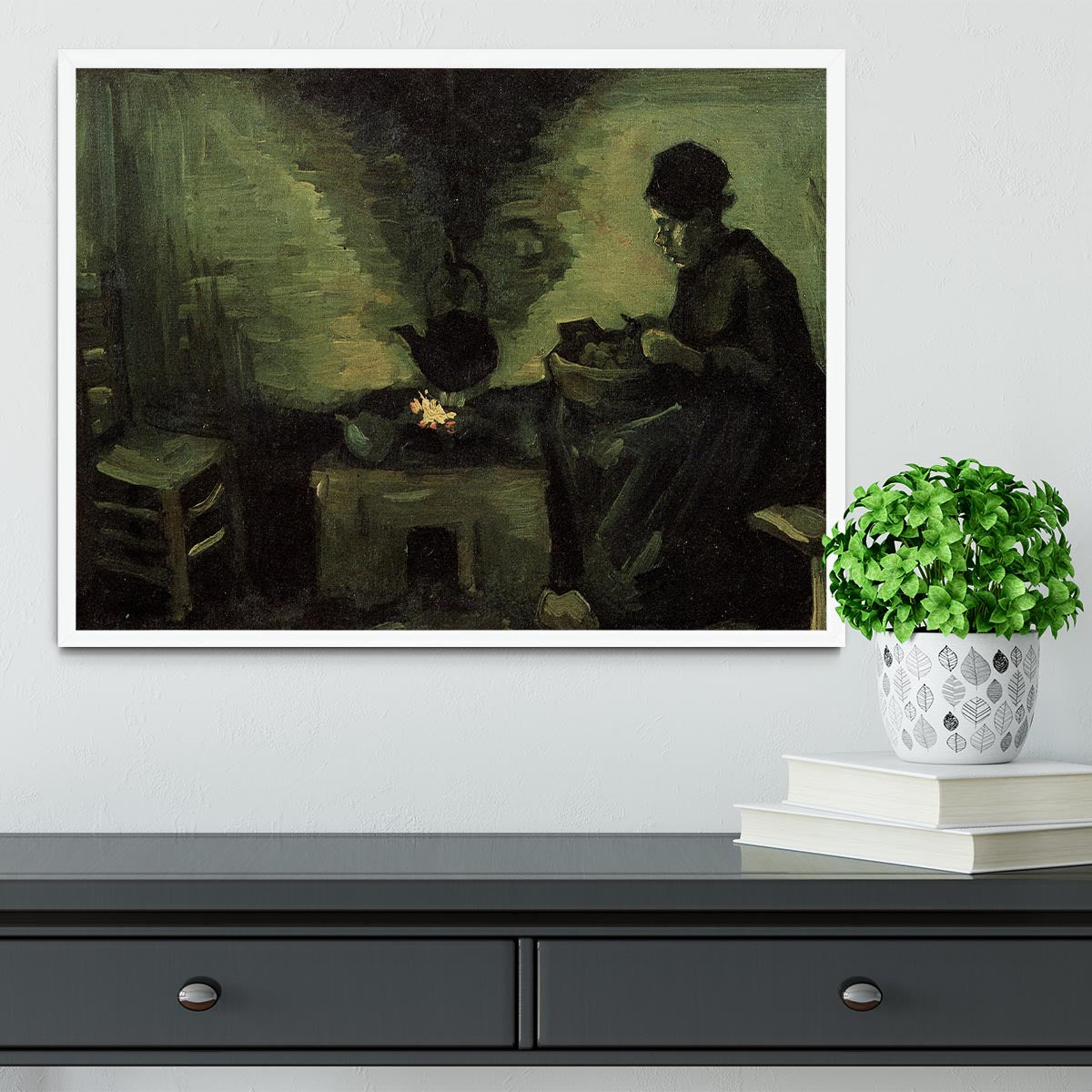 Framed print of Van Gogh's Peasant Woman by the Fireplace, showcasing vibrant colors and intricate details.