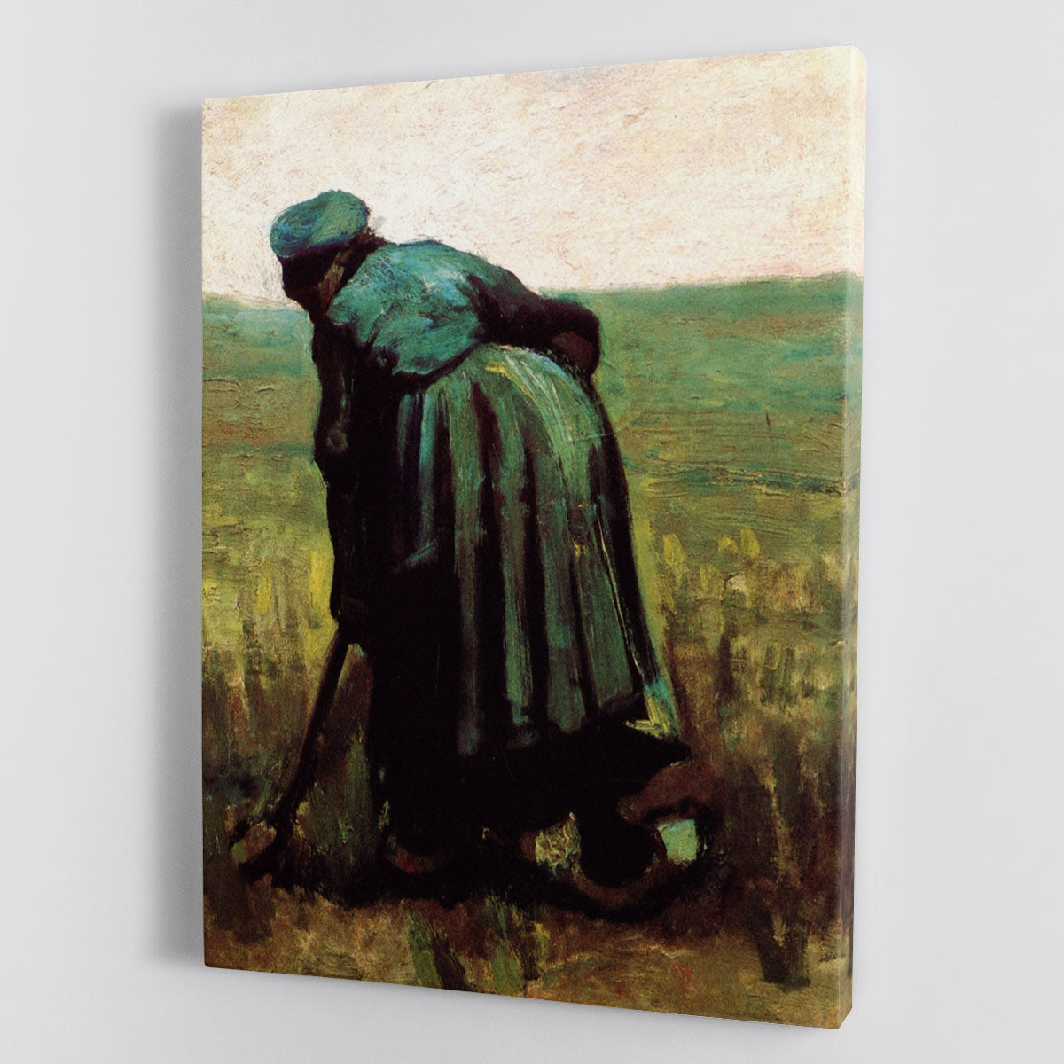 Canvas print of Peasant Woman Digging by Van Gogh, showcasing vibrant colors and expressive brushwork.