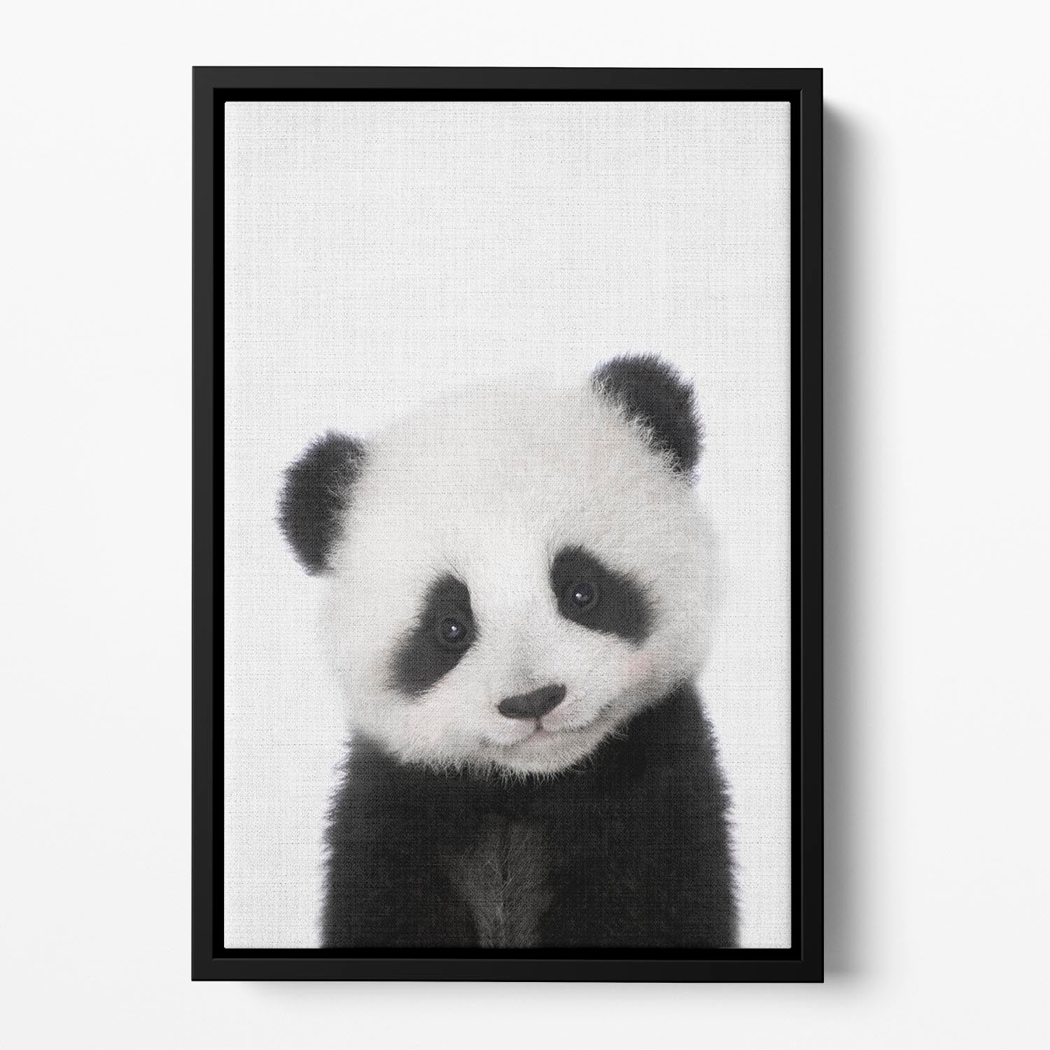 A vibrant floating framed canvas featuring a playful baby panda in an abstract design, perfect for home decor.