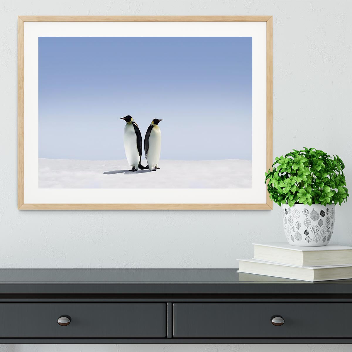 Framed print of penguins in a whimsical scene, showcasing vibrant colors and high-quality craftsmanship.