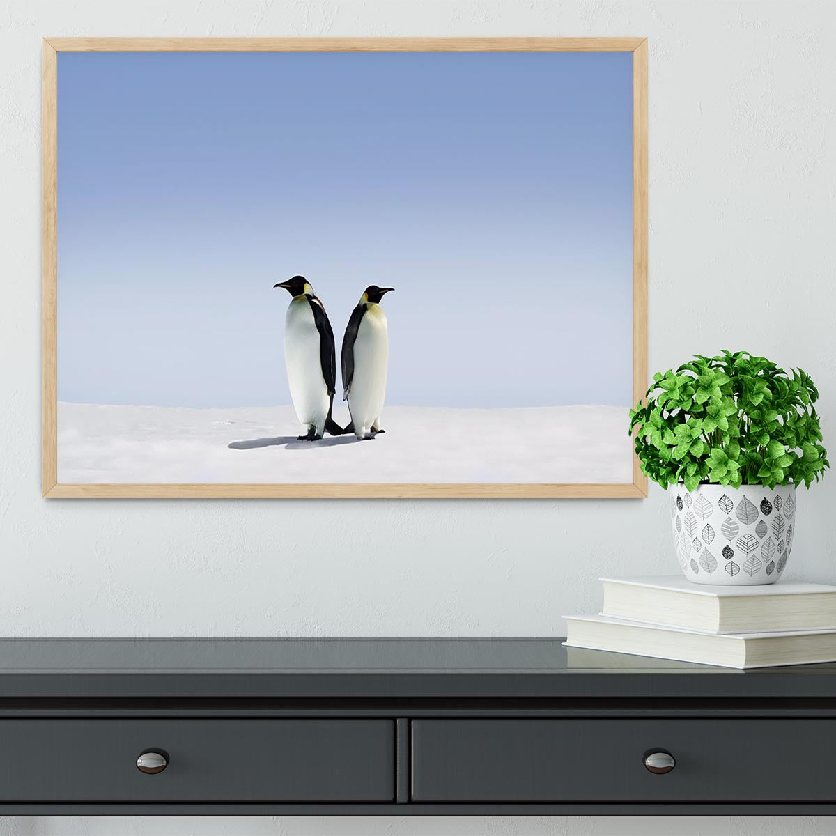 Framed print of penguins in a whimsical scene, showcasing vibrant colors and high-quality craftsmanship.