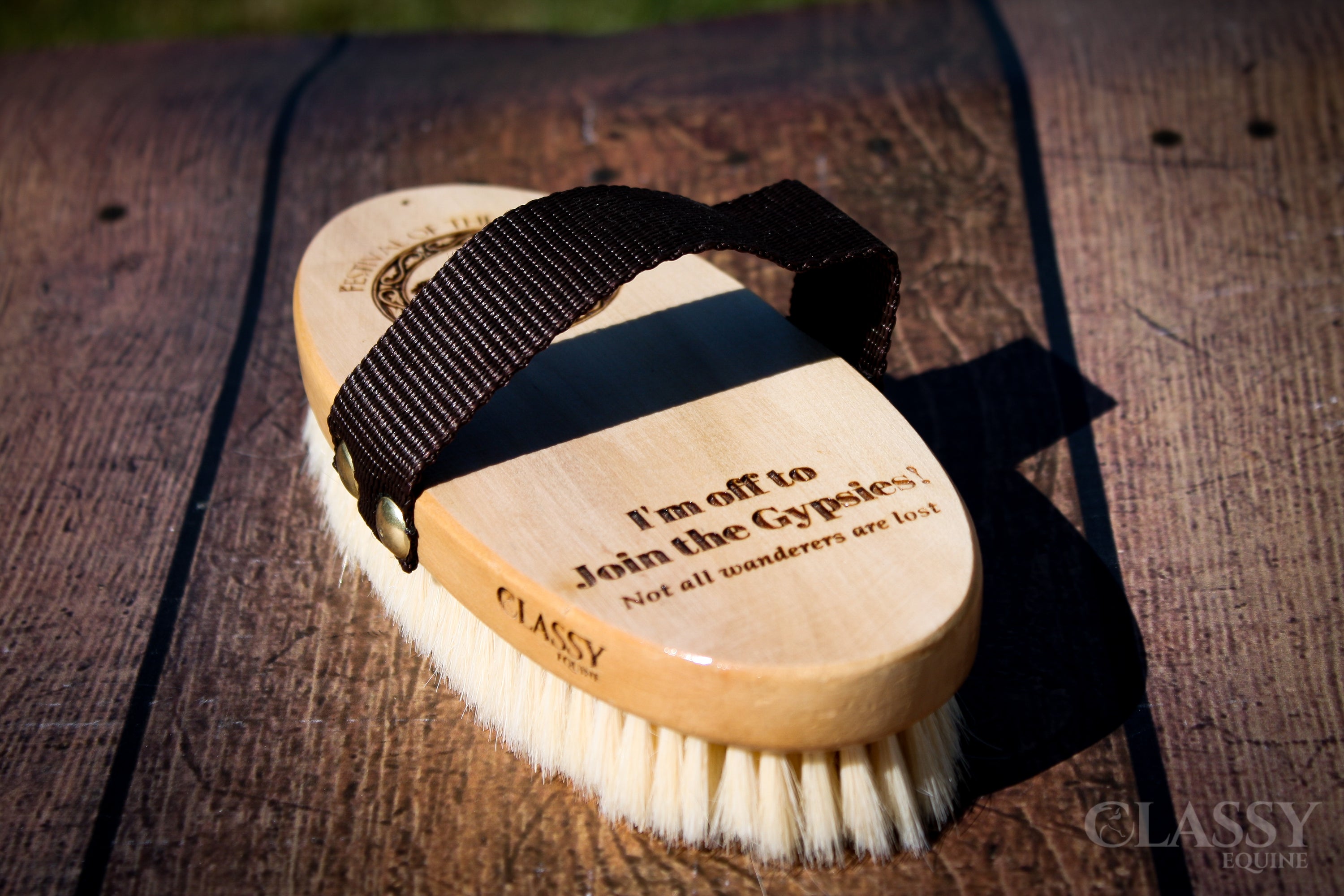 Personalized oval goat hair body brush with a varnished wood back and nylon strap, ideal for horse grooming.