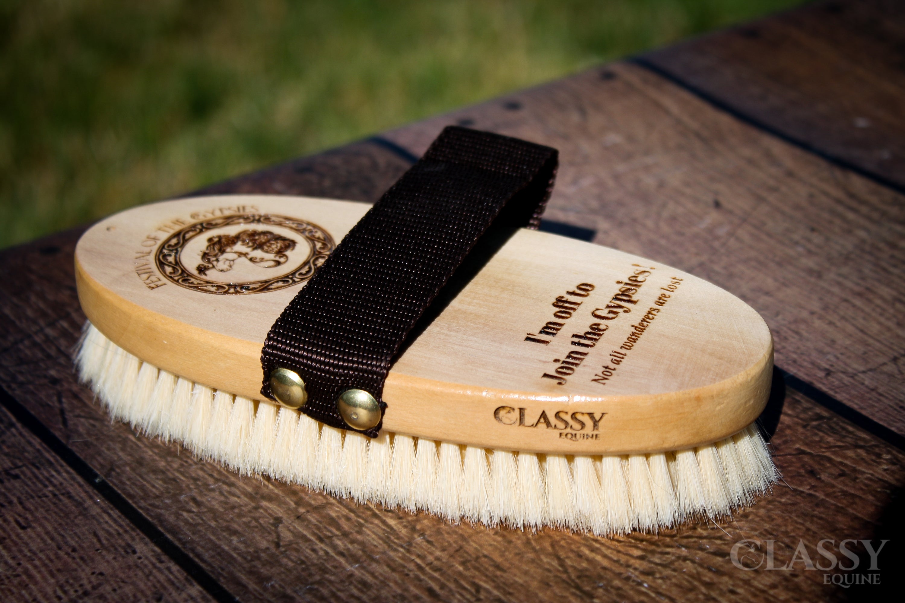 Personalized oval goat hair body brush with a varnished wood back and nylon strap, ideal for horse grooming.