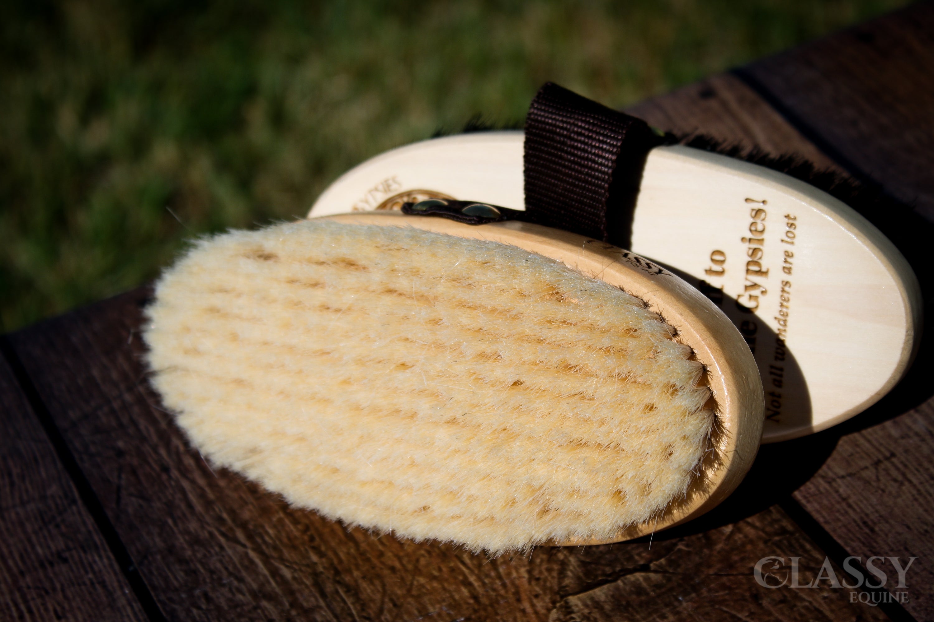 Personalized oval goat hair body brush with a varnished wood back and nylon strap, ideal for horse grooming.