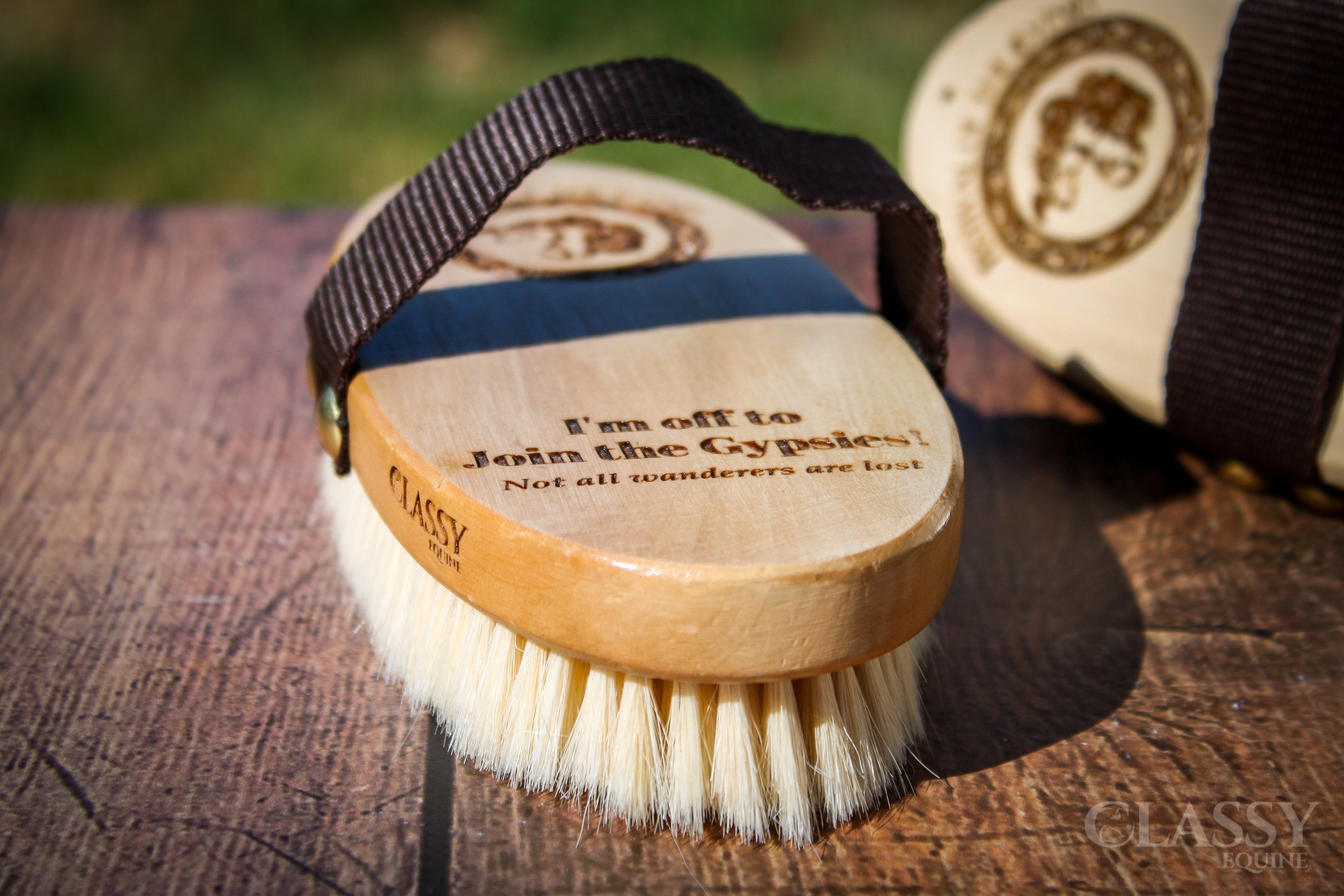 Personalized oval goat hair body brush with a varnished wood back and nylon strap, ideal for horse grooming.