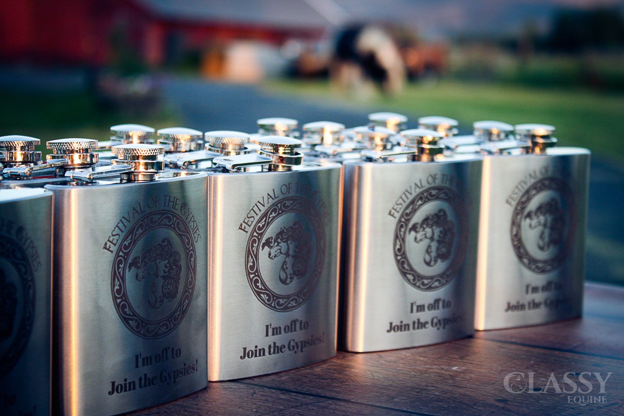 Personalized stainless steel 6 oz hip flask with custom engraving options, showcasing a sleek design and compact size.