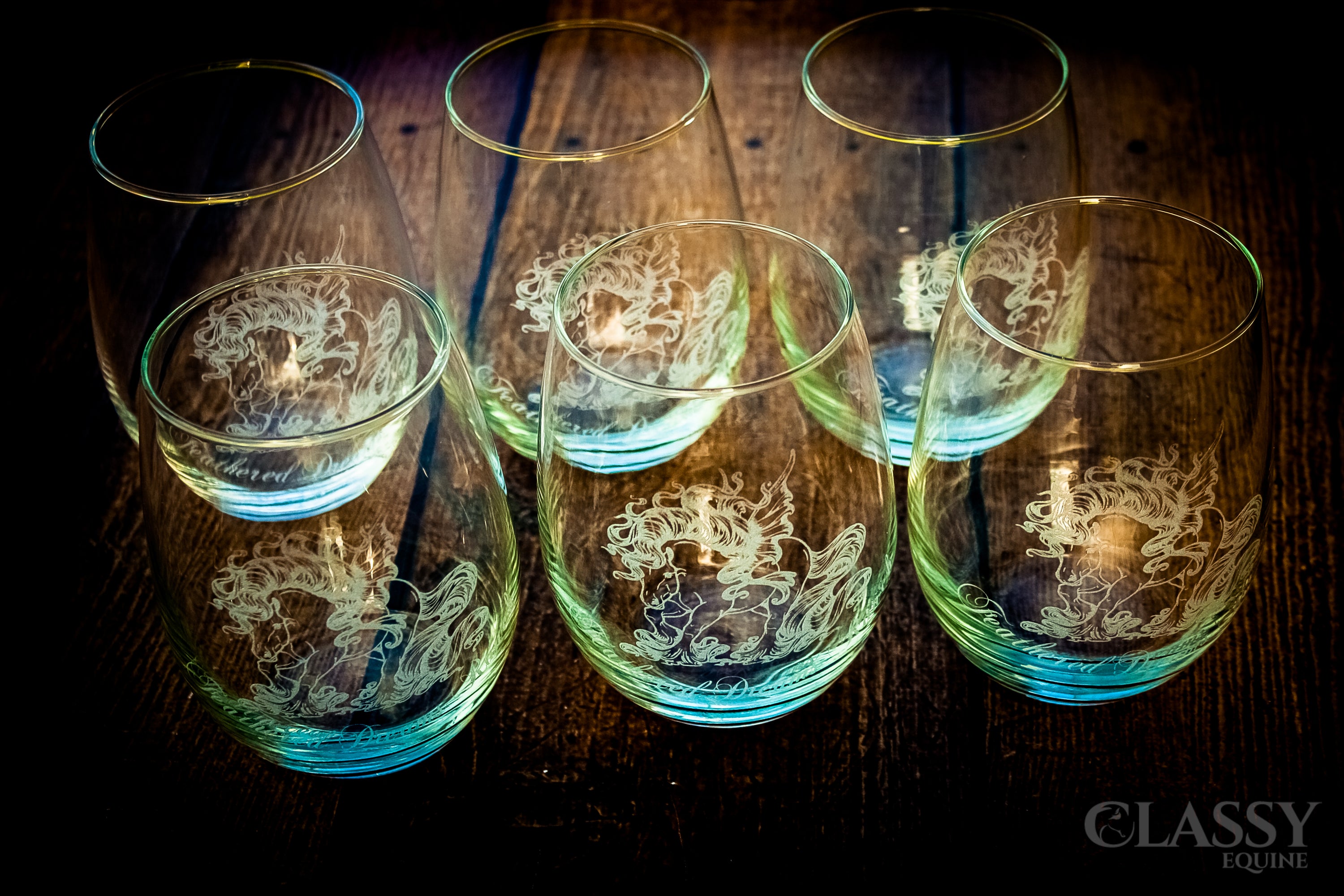 A set of two elegant personalized stemless wine glasses, showcasing custom engravings and a modern design, perfect for any occasion.