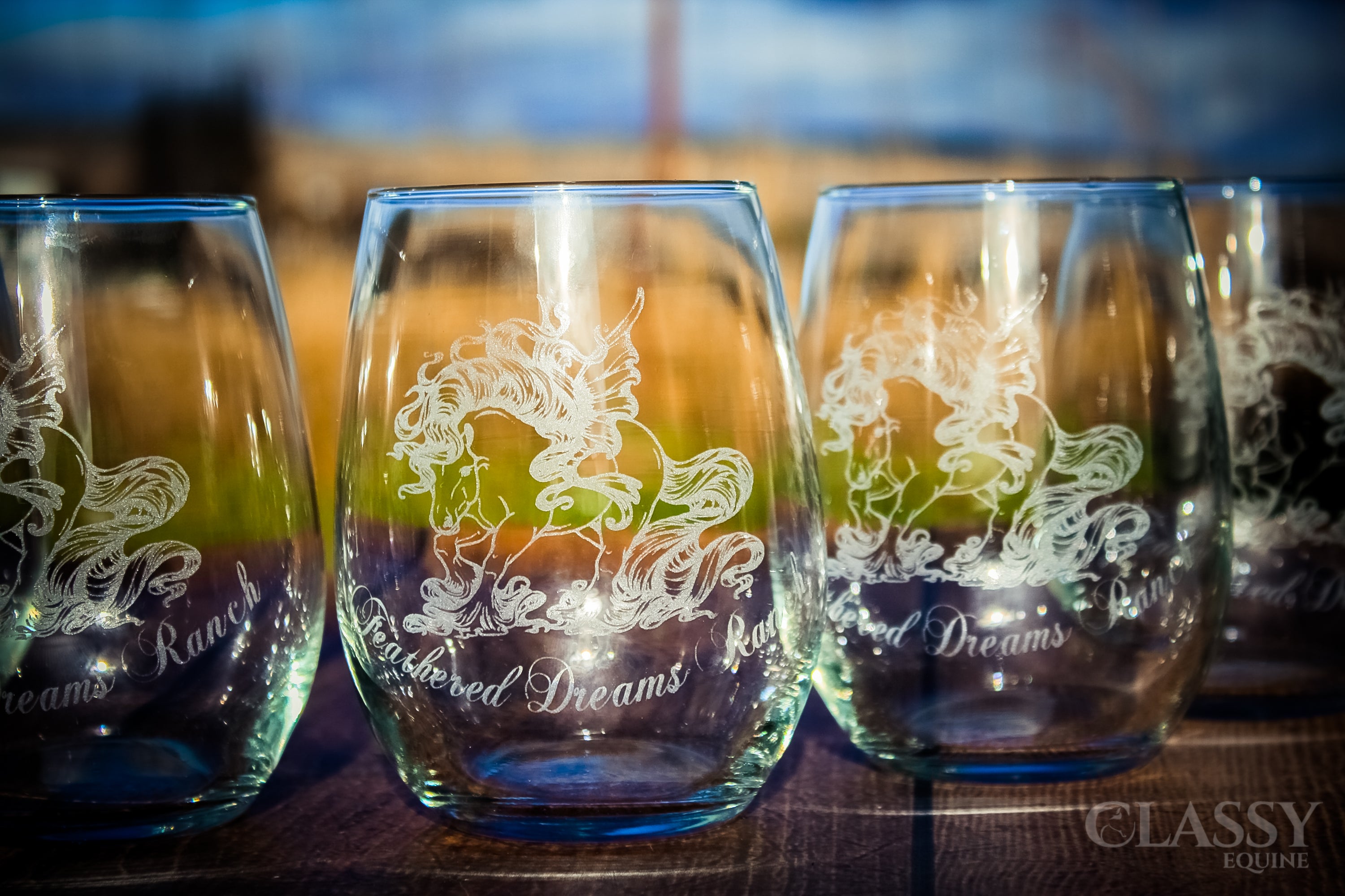 A set of two elegant personalized stemless wine glasses, showcasing custom engravings and a modern design, perfect for any occasion.
