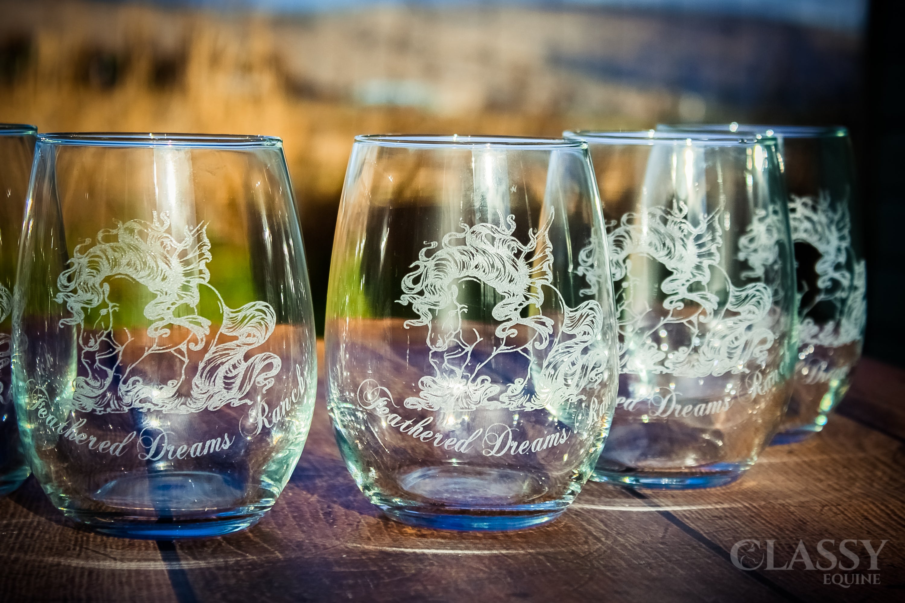 A set of two elegant personalized stemless wine glasses, showcasing custom engravings and a modern design, perfect for any occasion.