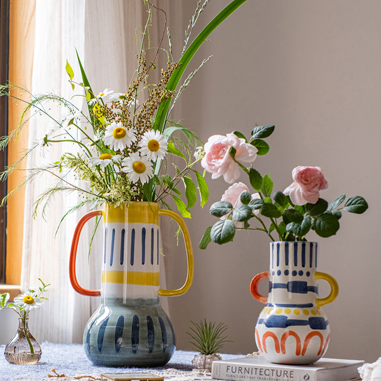 A beautifully handcrafted Picasso Ceramic Art Table Vase with handles, showcasing a vibrant multi-color glazed finish.