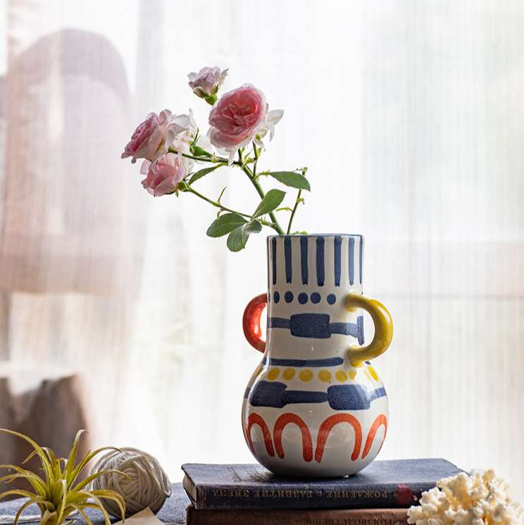 A beautifully handcrafted Picasso Ceramic Art Table Vase with handles, showcasing a vibrant multi-color glazed finish.