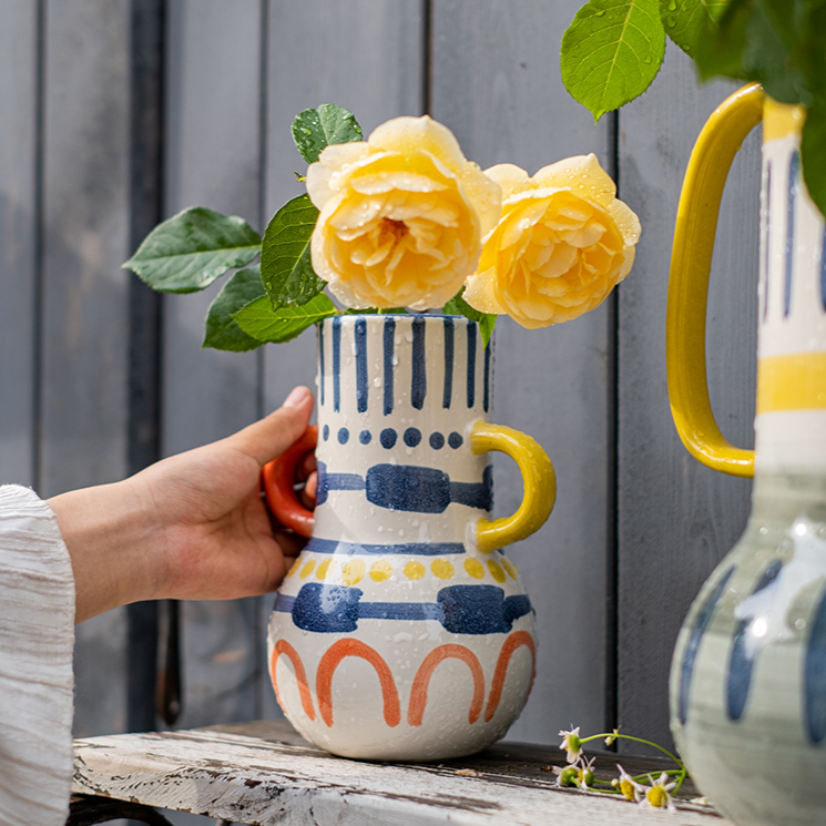 A beautifully handcrafted Picasso Ceramic Art Table Vase with handles, showcasing a vibrant multi-color glazed finish.