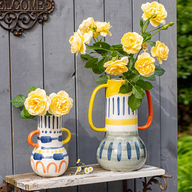 A beautifully handcrafted Picasso Ceramic Art Table Vase with handles, showcasing a vibrant multi-color glazed finish.