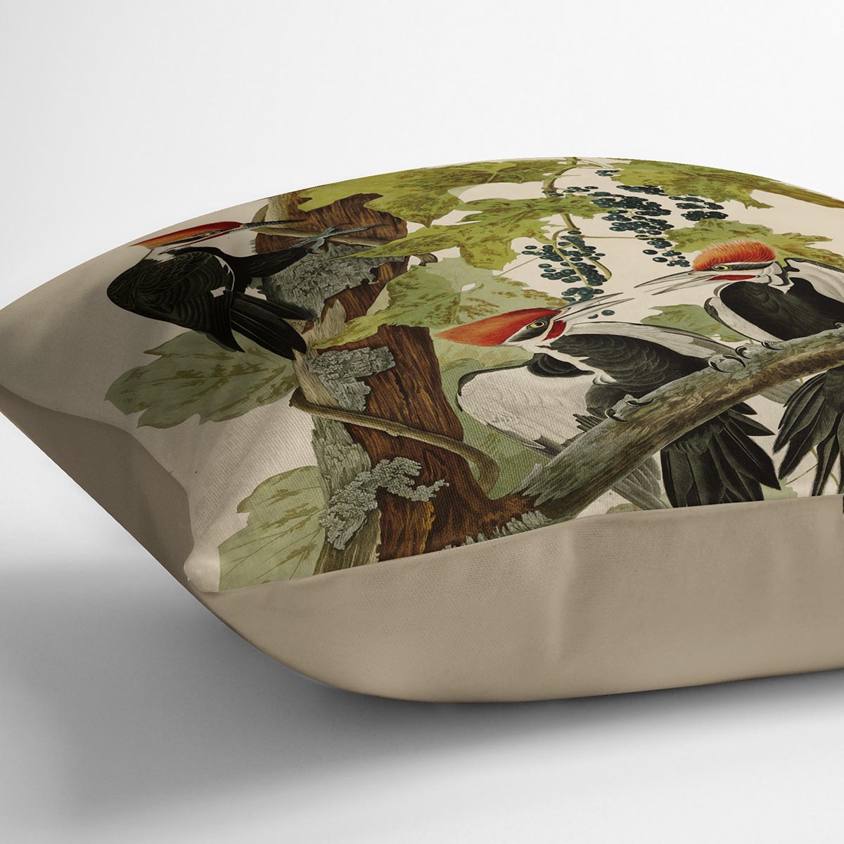 A vibrant Pileated Woodpecker cushion featuring colorful abstract designs on luxurious vegan faux suede, perfect for home decor.