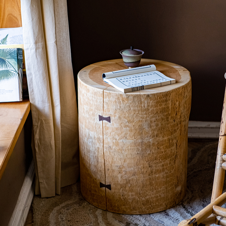 Pine Wood Pedestal Table showcasing natural wood grain and elegant design, perfect for side use in any room.