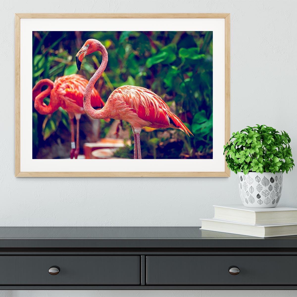 Close-up of a pink flamingo in a framed print, showcasing vibrant colors and intricate details.