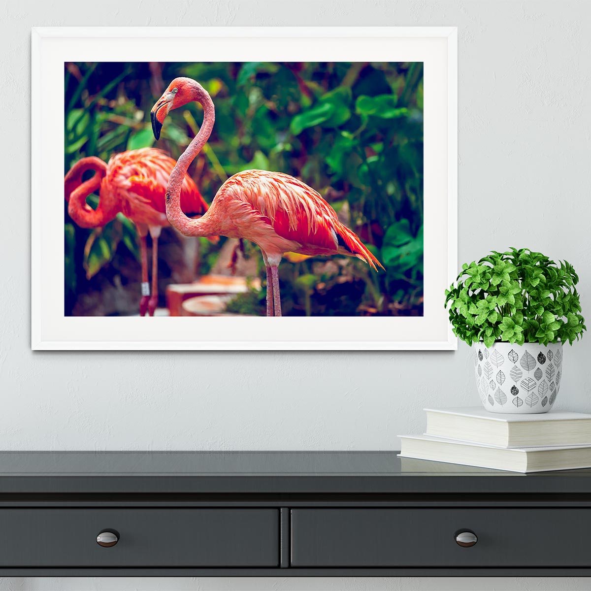 Close-up of a pink flamingo in a framed print, showcasing vibrant colors and intricate details.