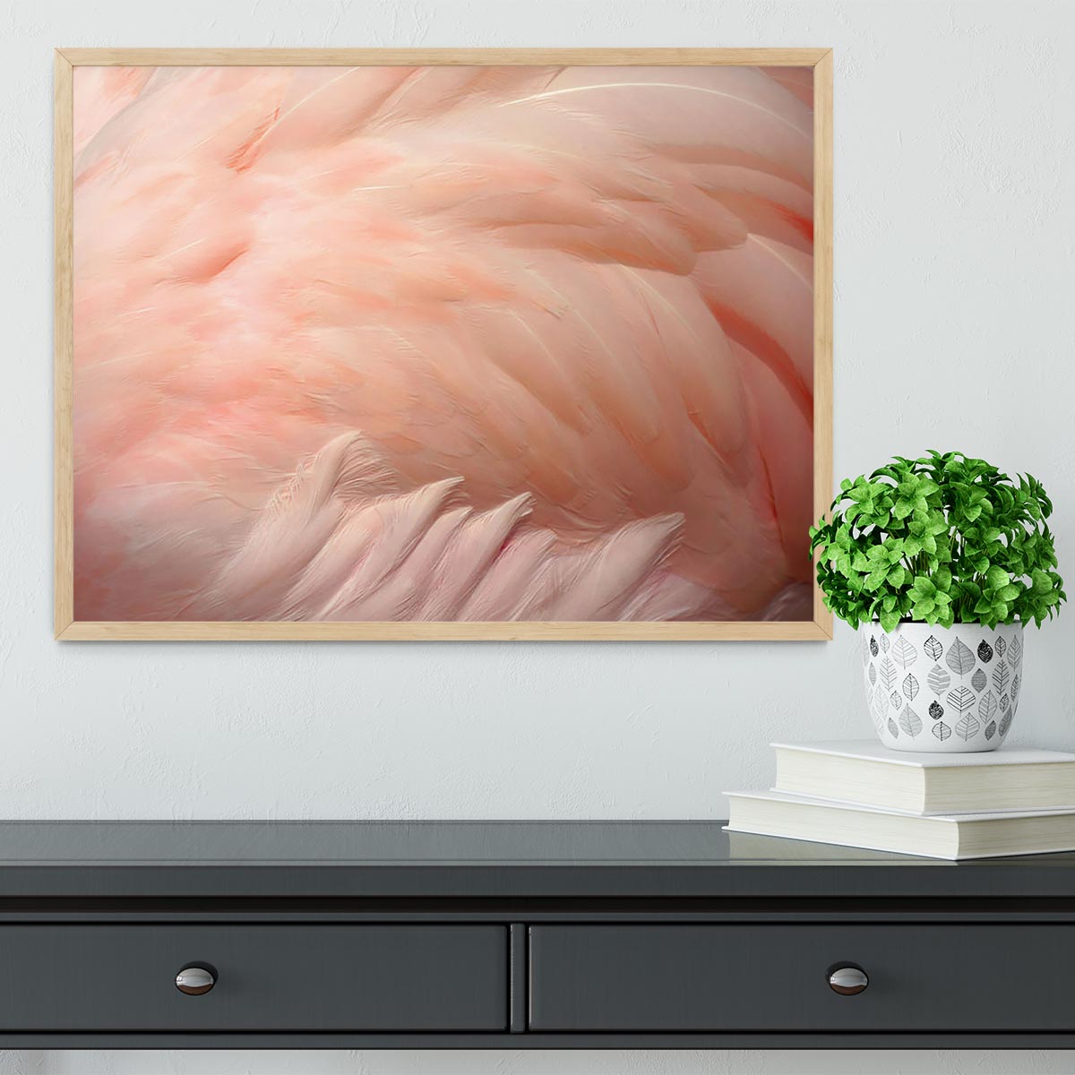 A beautifully framed print of pink flamingo feathers, showcasing vibrant colors and intricate details, perfect for home decor.