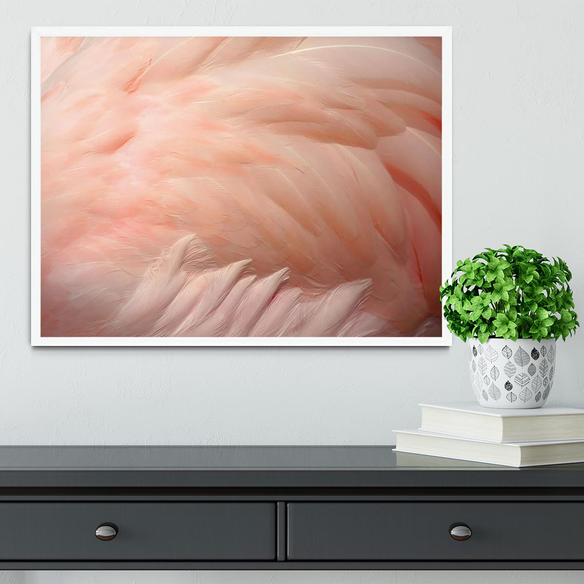 A beautifully framed print of pink flamingo feathers, showcasing vibrant colors and intricate details, perfect for home decor.