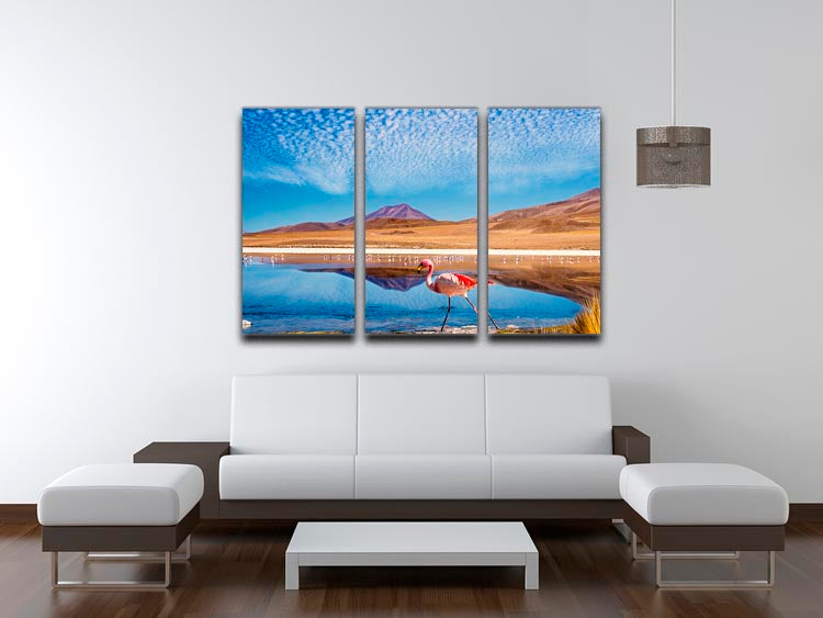 A vibrant 3-panel canvas print featuring a pink flamingo walking through a scenic background, perfect for home decor.