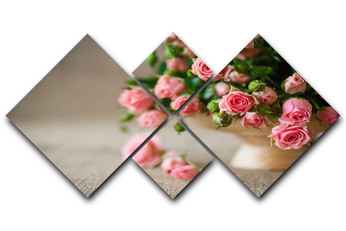 A beautiful multi-panel canvas featuring pink roses on a rustic burlap table, elegantly arranged in four square sections.