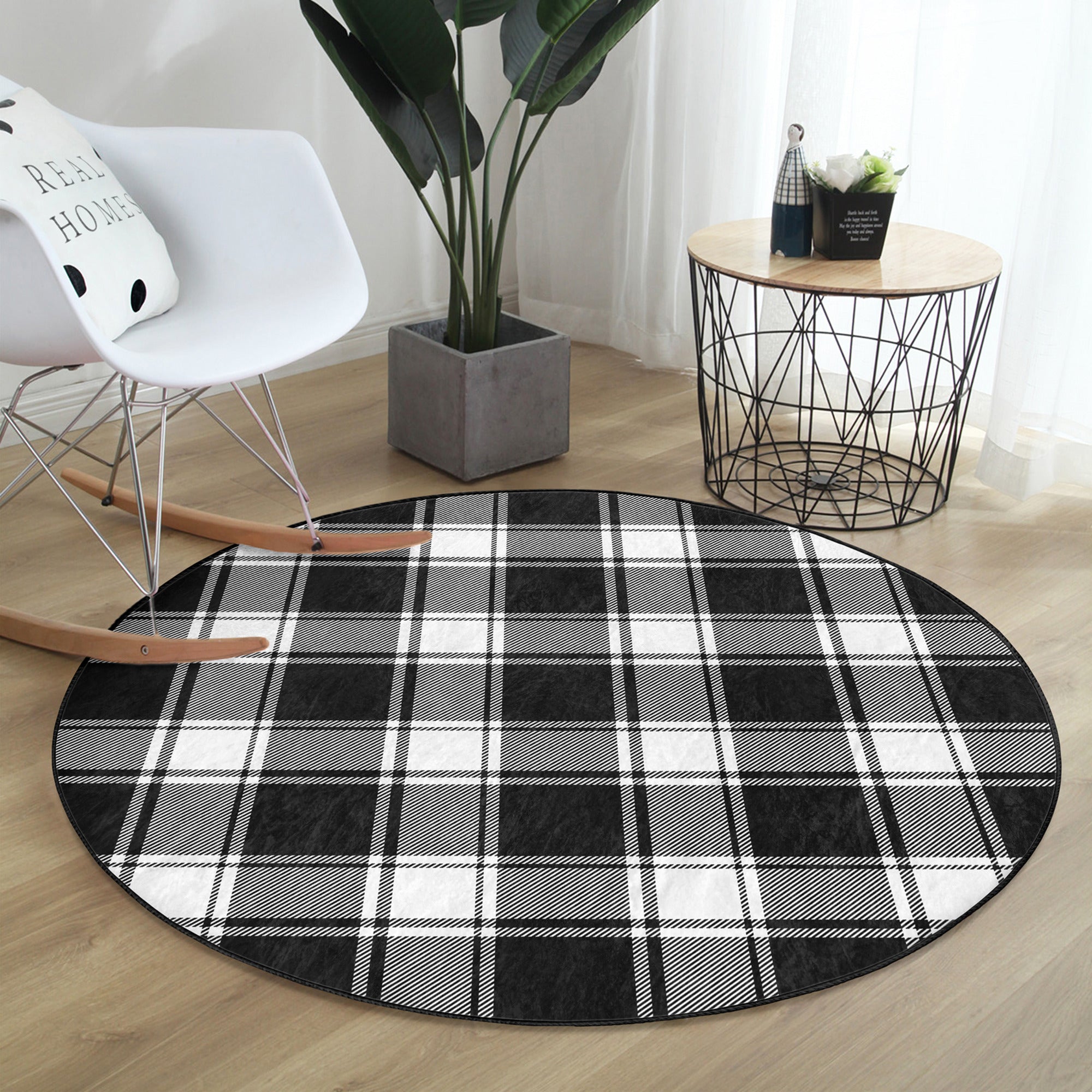A stylish plaid round rug in soft velvet fabric, showcasing a vibrant pattern suitable for living rooms and bedrooms.