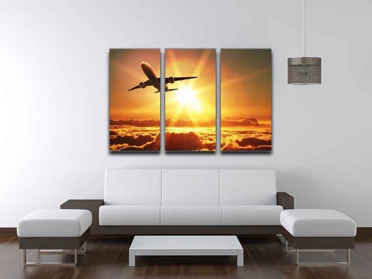 A beautiful 3-panel canvas print depicting a plane taking off at sunrise, showcasing vibrant colors and a captivating scene.