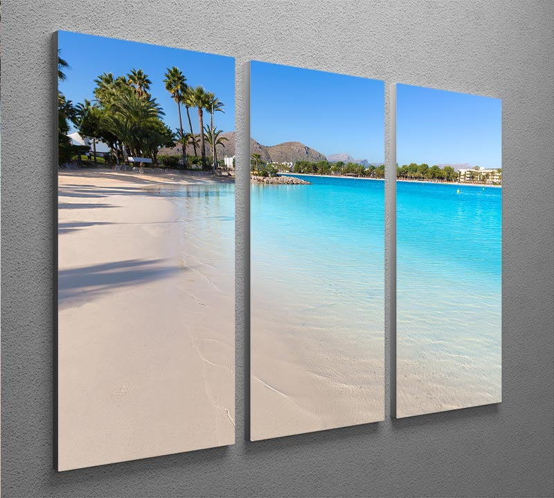 A beautiful 3-panel canvas print depicting the serene Platja de Alcudia beach with clear waters and golden sands.