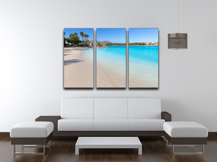 A beautiful 3-panel canvas print depicting the serene Platja de Alcudia beach with clear waters and golden sands.