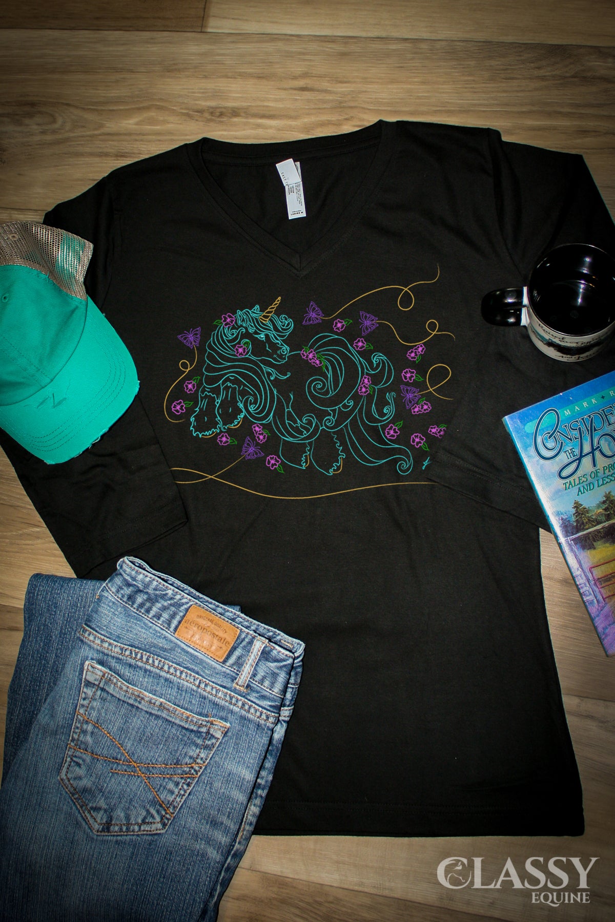 Plumeria Unicorn Women's 3/4 Sleeve V Neck Tee featuring a whimsical unicorn design on soft cotton fabric.