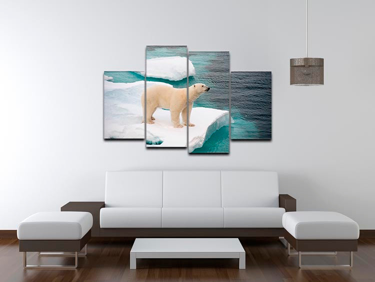 A stunning 4-panel canvas artwork featuring a polar bear walking on sea ice, showcasing the beauty of nature.